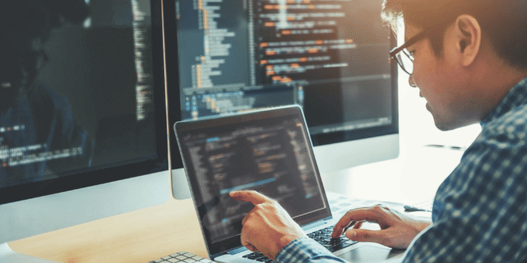 Software development and coding on laptop