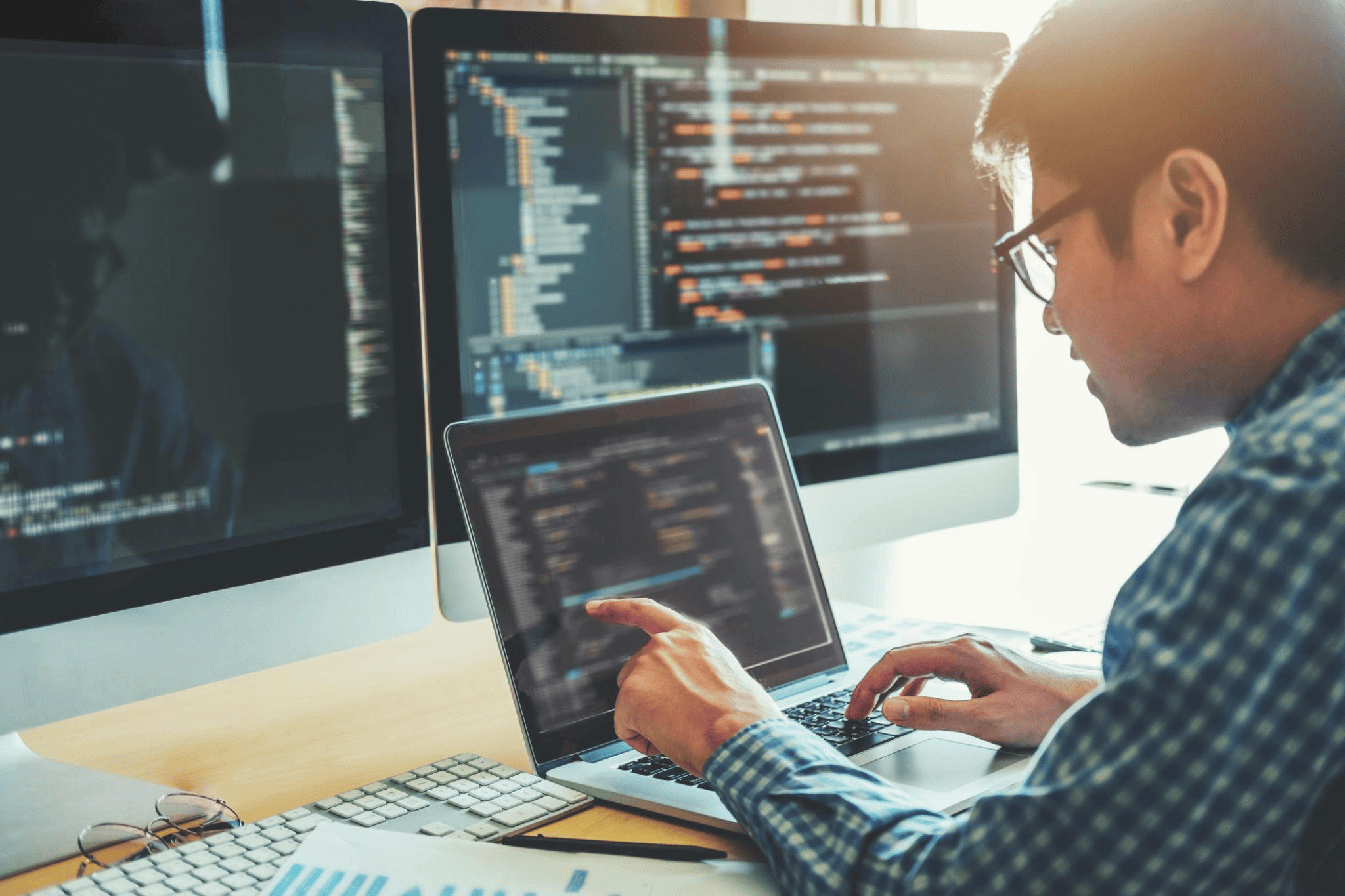 Software development and coding on laptop